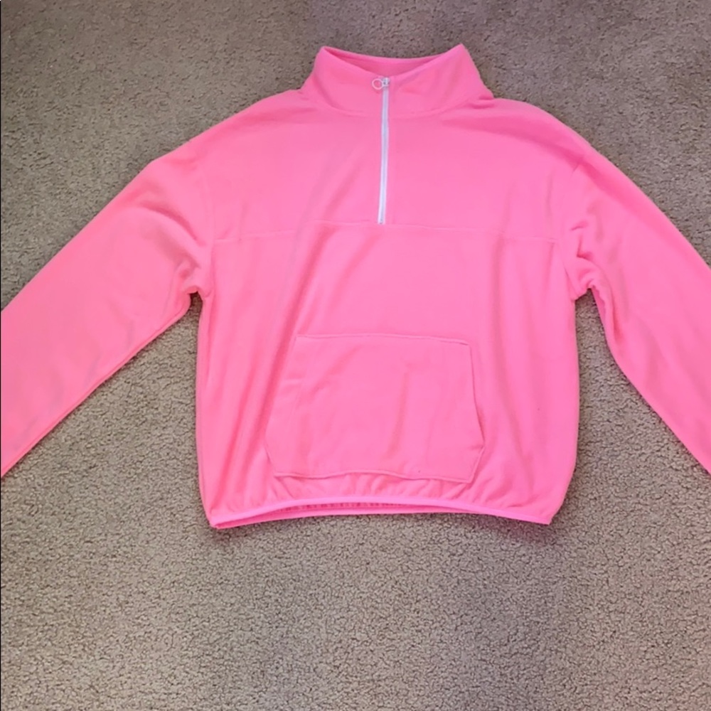 Neon pink quarter zip from the brand SO